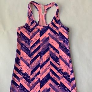 Like new Ivivva tank top. Fits girls size 12.